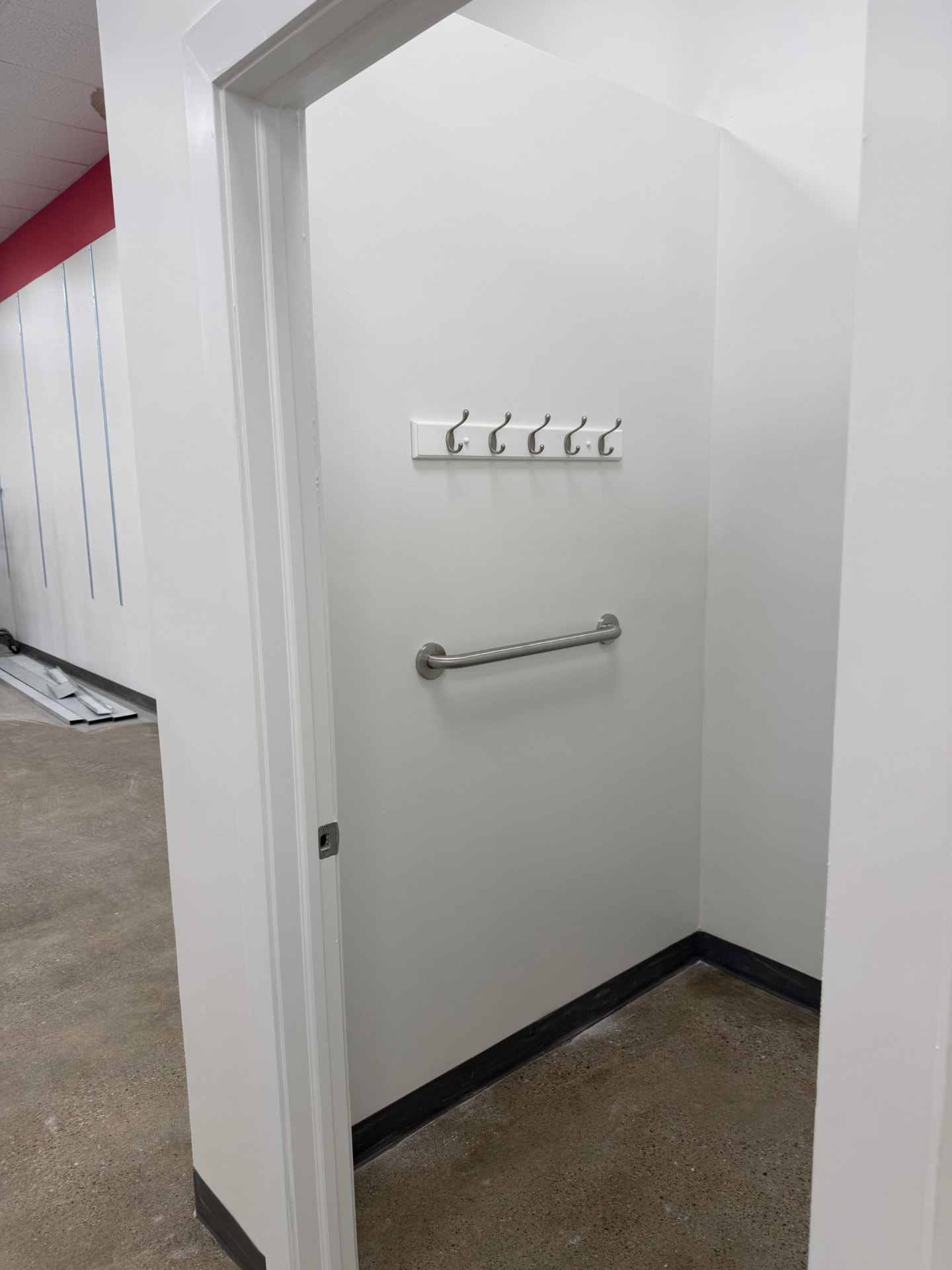 Fitting Room Interior with Hardware — commercial renovation project in Ottawa